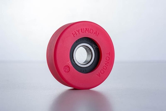 Warna Pink Eskalator Suku Cadang Roller Model FUJTEC Spesifikasi Ф76 * 25